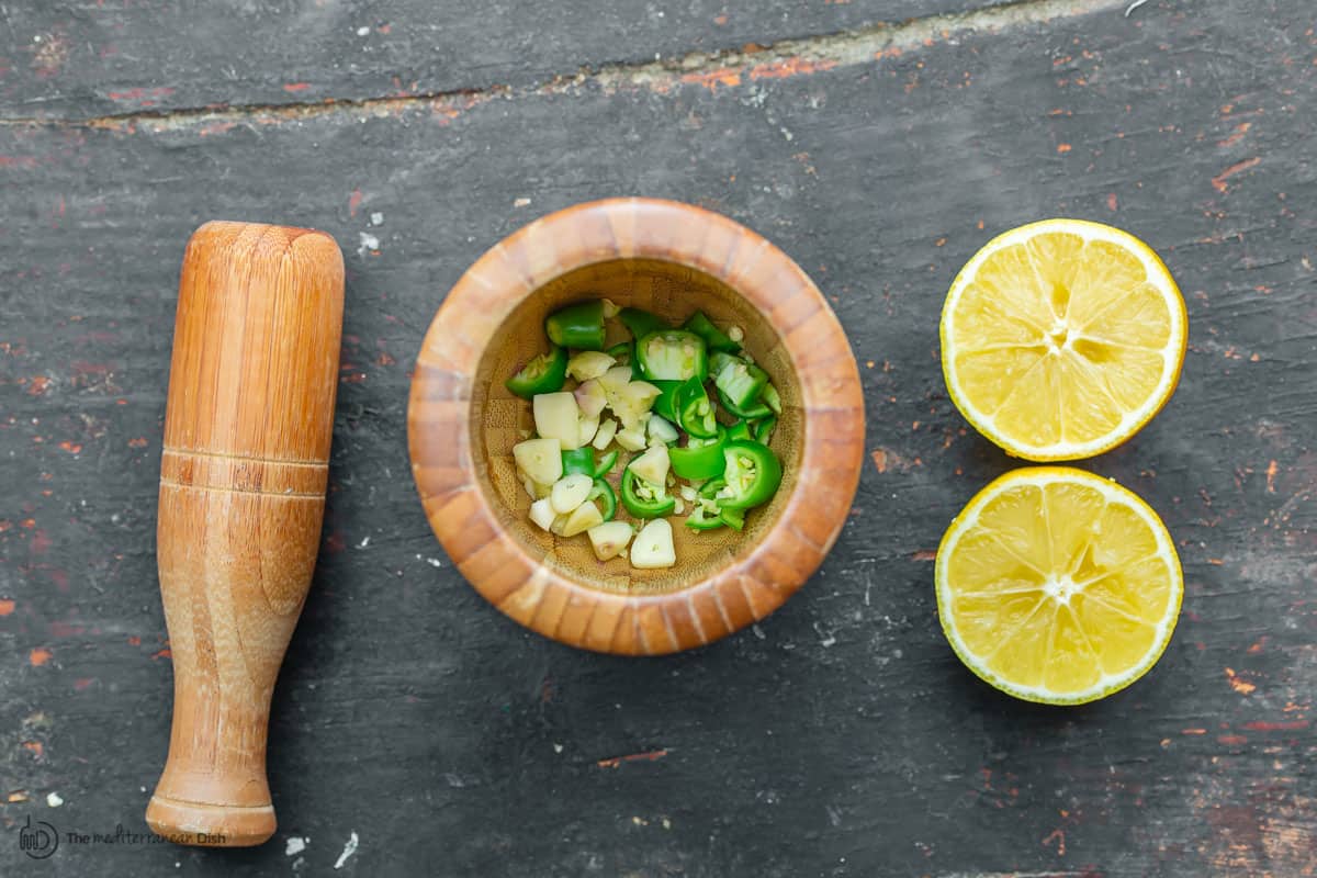 garlic, chili pepper and lemons for lemon sauce