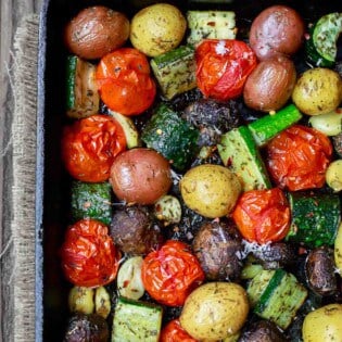 Italian Oven Roasted Vegetables | The Mediterranean Dish. Simple and delicious oven roasted vegetables, the Italian way! Not your average side dish! These veggies will be your new favorite! Comes together in 20 mins or so. See the recipe on TheMediterraneanDish.com