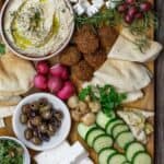 Mediterranean breakfast or brunch with falafel, hummus, baba ganoush,fresh vegetables and more