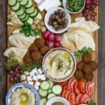 Ultimate Mediterranean Brunch Board with hummus, baba ganoush, falafel, tabouli and fresh vegetables