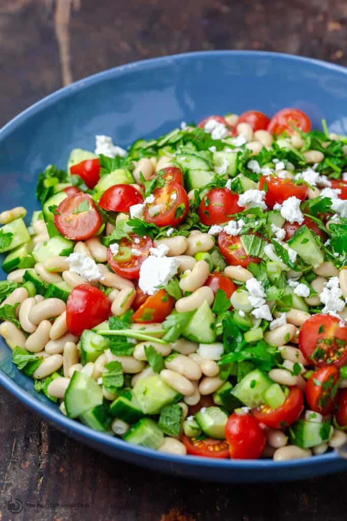 White Bean Salad with chopped vegetables and fresh herbs