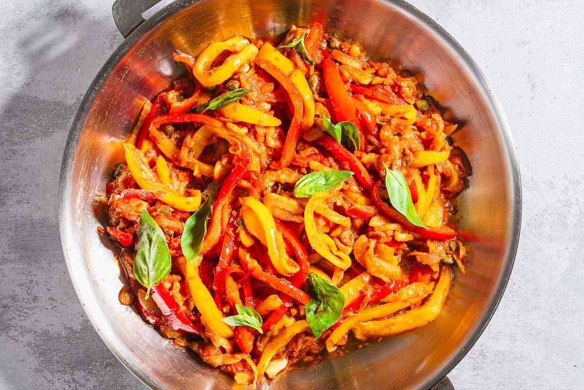 A close up of the peperonata in a skillet.