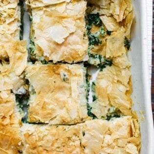 Spanakopita served in a baking dish