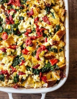 close up of cooked breakfast strata in a baking dish.