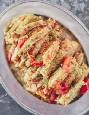 Stuffed cabbage rolls with tomatoes on a plate