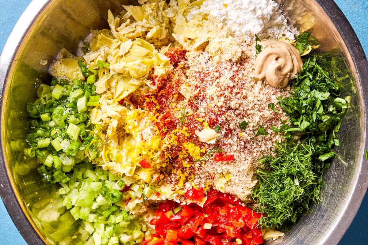 The ingredients for the vegetarian crab cakes in a bowl just before being mixed together.