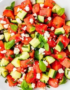 close up of watermelon salad in a bowl.