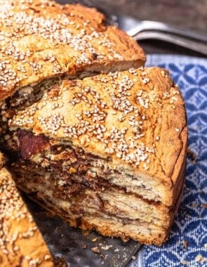 slice of vasilopita showing layers and cinnamon sugar mixture